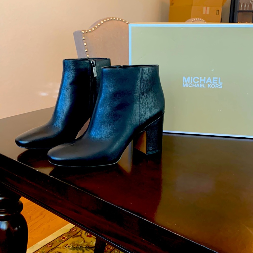 Michael Kors leather booties in Black Size 9 with about a 3 inch heel.